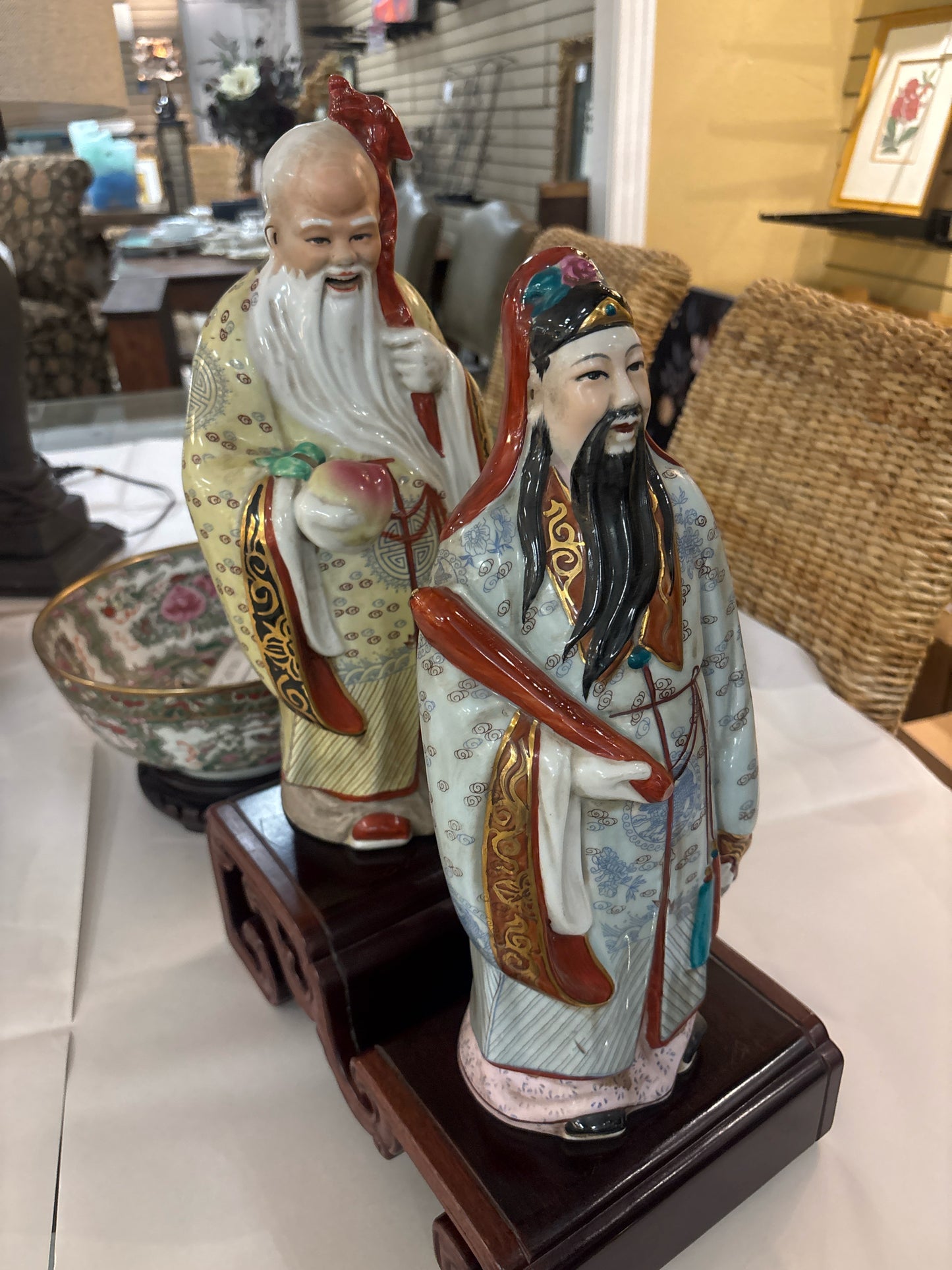 2 Asian Figurines on Wood Stand