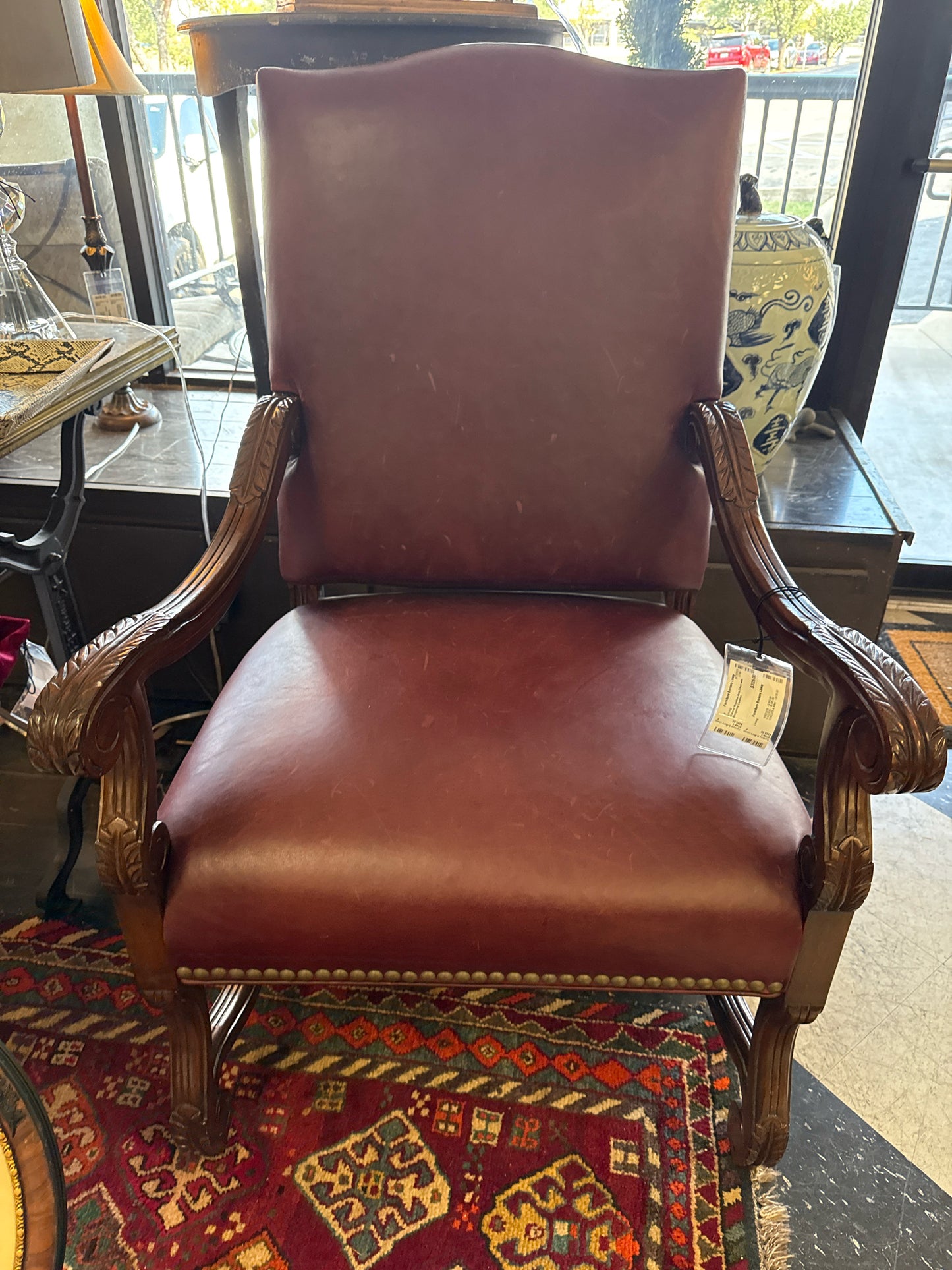 Carved Wooden Arm Chair with Burgundy Leather