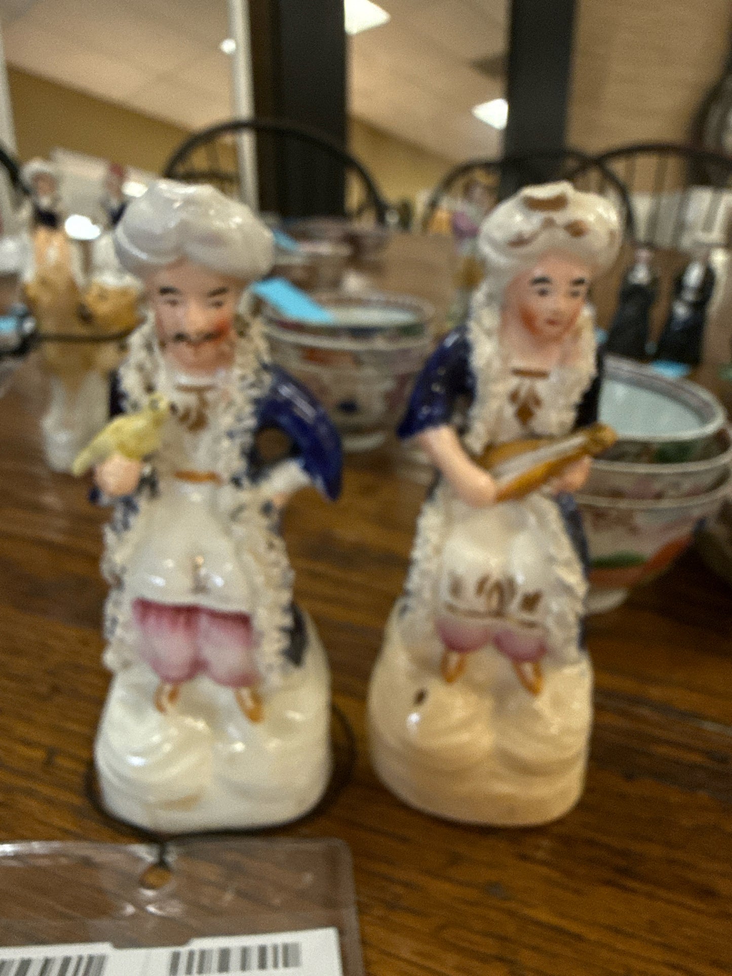 PAIR of Staffordshire Figurines- Man w/ Bird & Lady w/ Mandolin