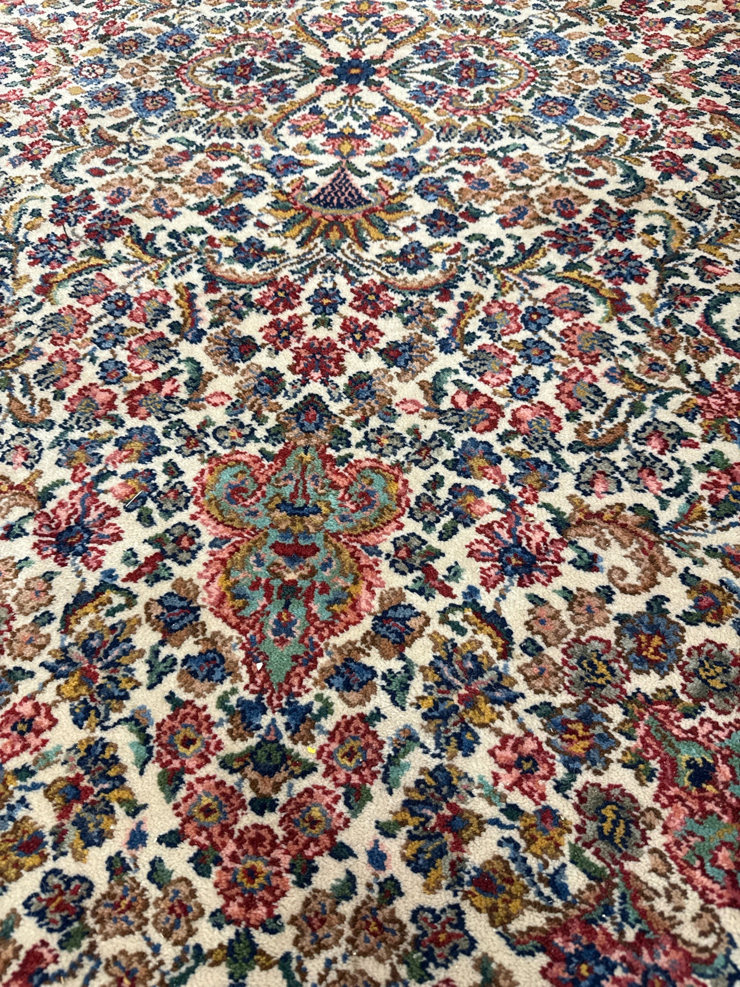 Karastan Rug Floral Reds/ Pale Blue /Green Background (6x9)